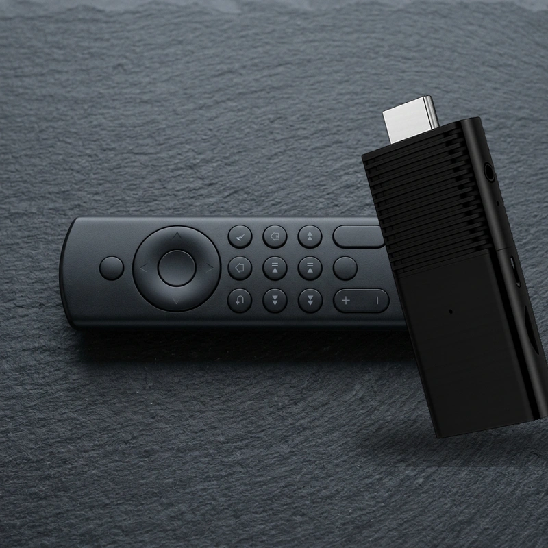 Flixy TV Stick unboxed hardware components and remote control